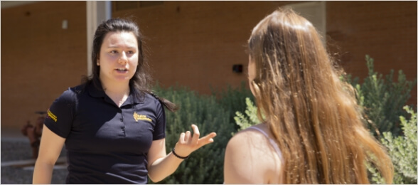 A Fulton Ambassador talks to a prospective student